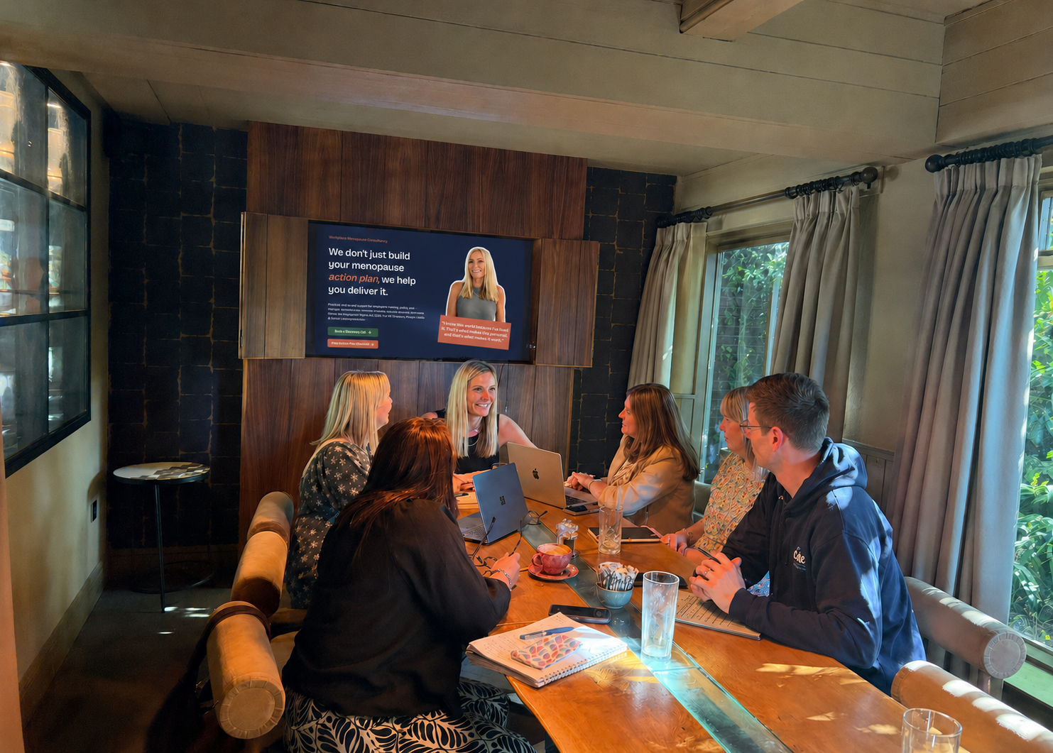 Group of employees and managers attending a workplace menopause awareness session delivered by MFO Coaching